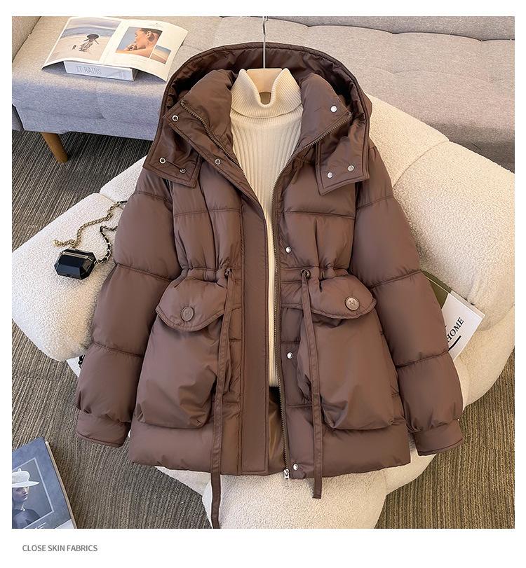 Padded clothes women's winter new long padded jackets close waist and look thin, thickened padded clothes, and thickened warm jackets.