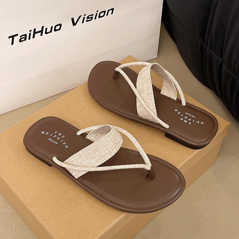 Retro niche woven flat-bottomed slippers for women's summer wear with skirts, vacation beach sandals