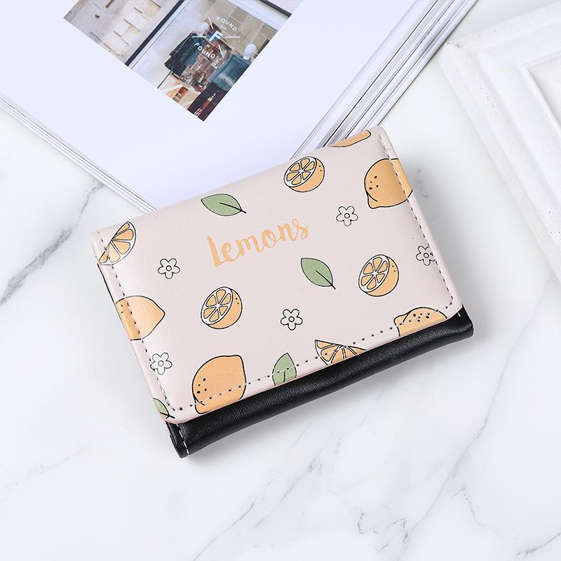 Japanisches und koreanisches Damen-Portemonnaie kurz neu dreifach faltbar Cartoon klein frisch Multi-Karten große Kapazität Studenten-Münzbeutel Portemonnaie