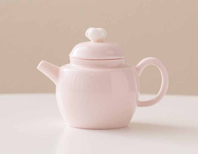 

Peach powder pinched flower Xishi pot Ceramic teapot Household handmade teapot Single pot Afternoon tea brewer Kung Fu tea set