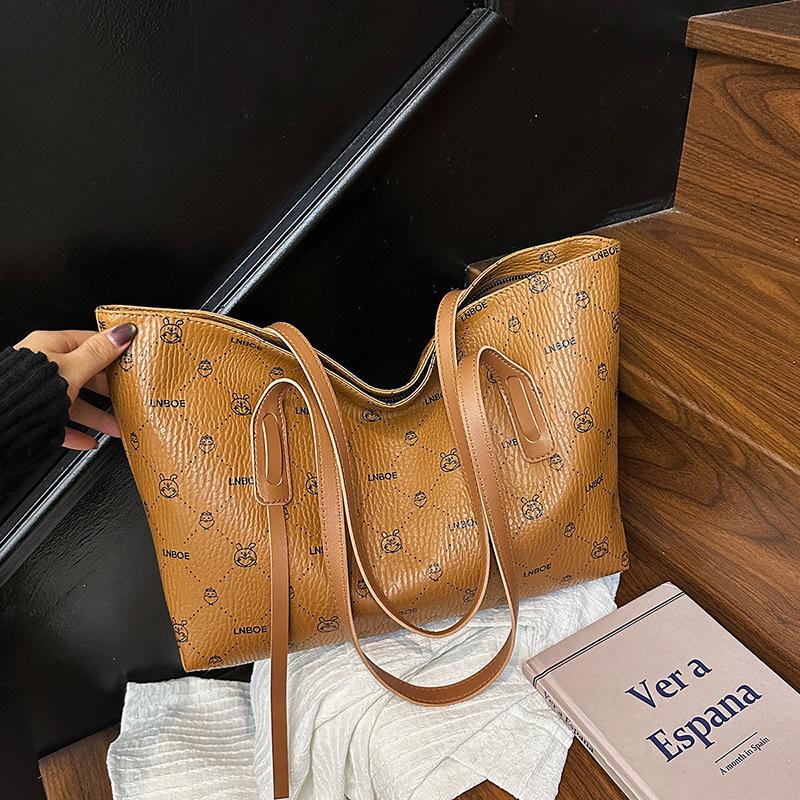 2025 Summer New Fashion Bag Large Capacity Casual Simple Tote Bag High Value Solid Color High Value Women's Bag