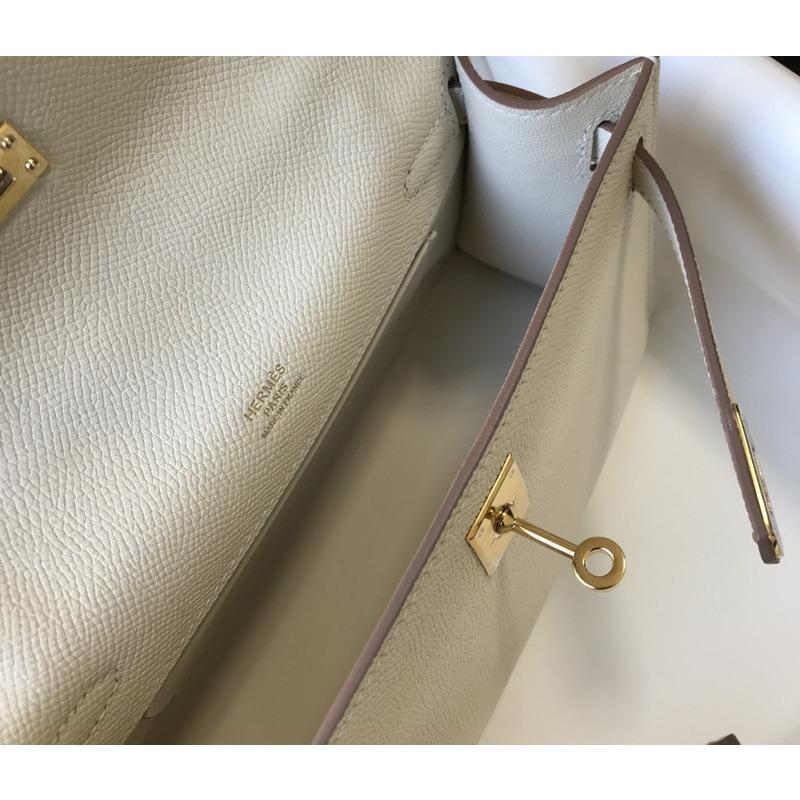 Nuova borsa da donna in vera pelle, mini generazione, alla moda, portatile, con palmo in pelle bovina di primo strato, 22 cm