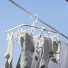 Portable White Plastic Clothes Hanger With 24 Clips For Efficient Drying