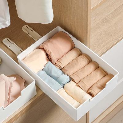 Organisateur d'armoire réglable avec tiroirs amovibles pour un rangement efficace à la maison