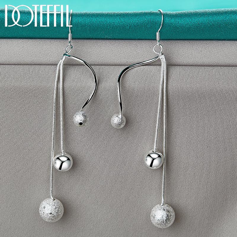 Urocze kolczyki z koralików srebrna biżuteria