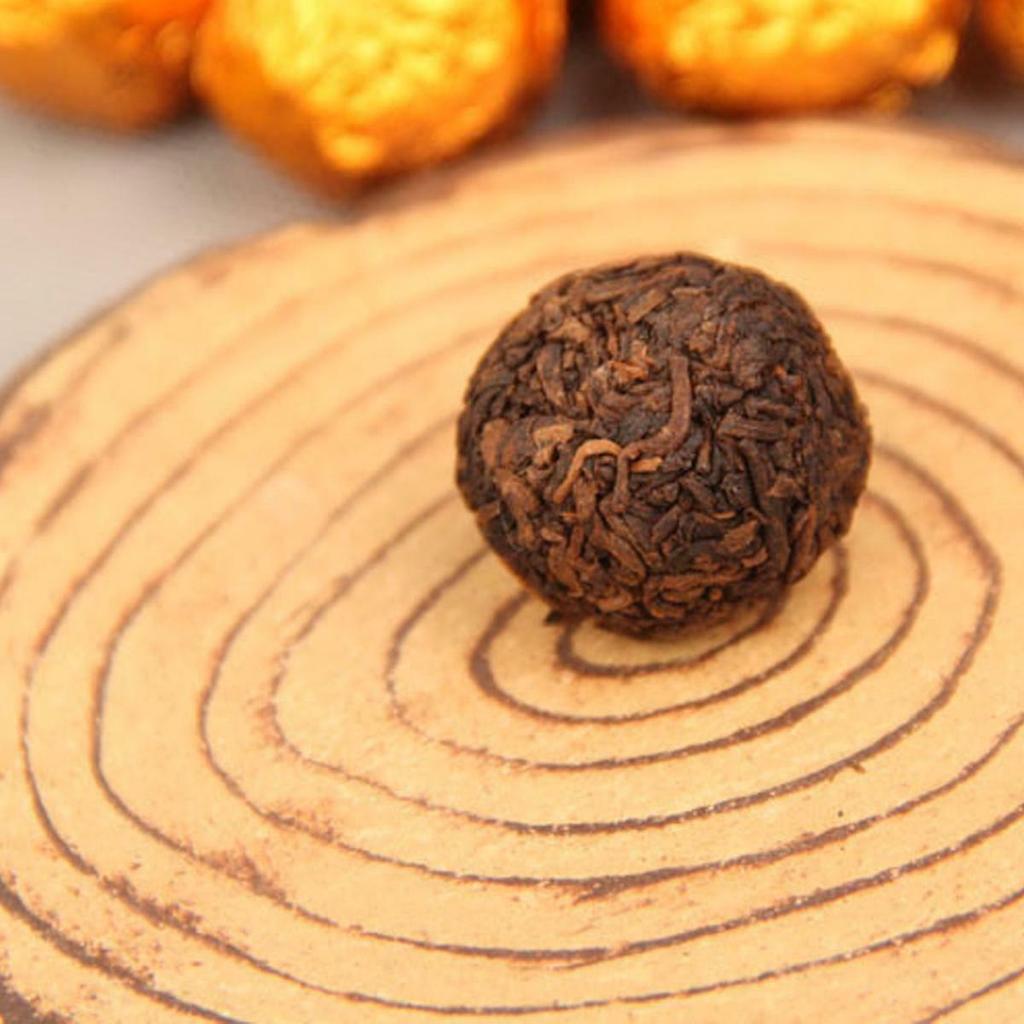 220g gekookte Puer-thee Handgemaakte Dragon Ball-cadeauthee Rijpe Pu erh-thee Oude boomthee
