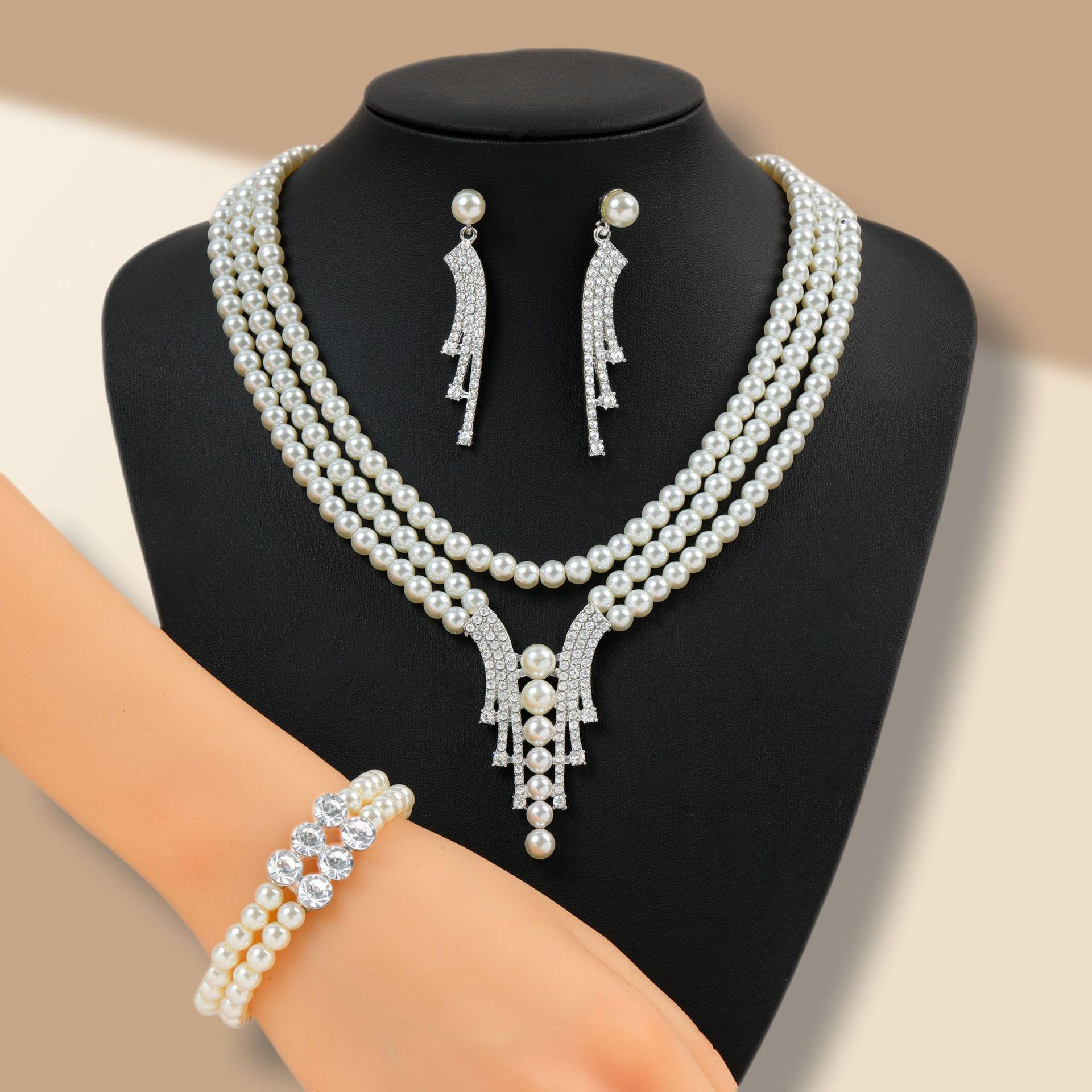 Retro Tassel Pearl Jewelry Set: Necklace, Earrings & Bracelet for Elegant Women s Formal Wear серебряный