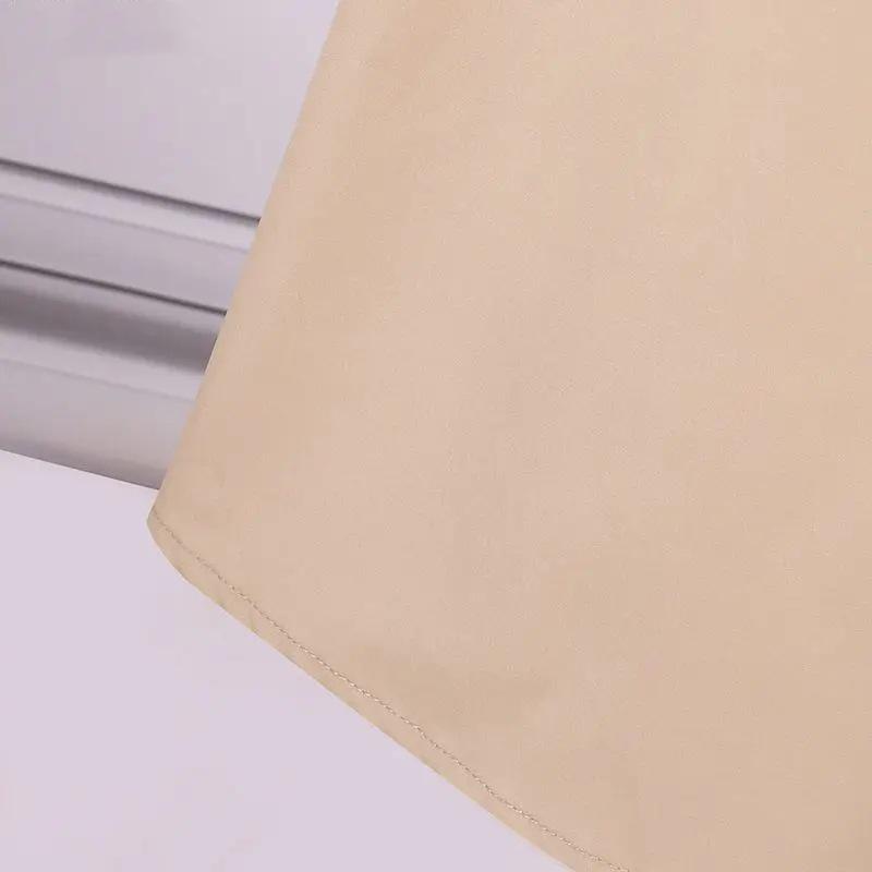 Muslimské dámské jednobarevné šaty košilového střihu s dlouhým rukávem, klopou s mašlí, kapsami a kardiganem