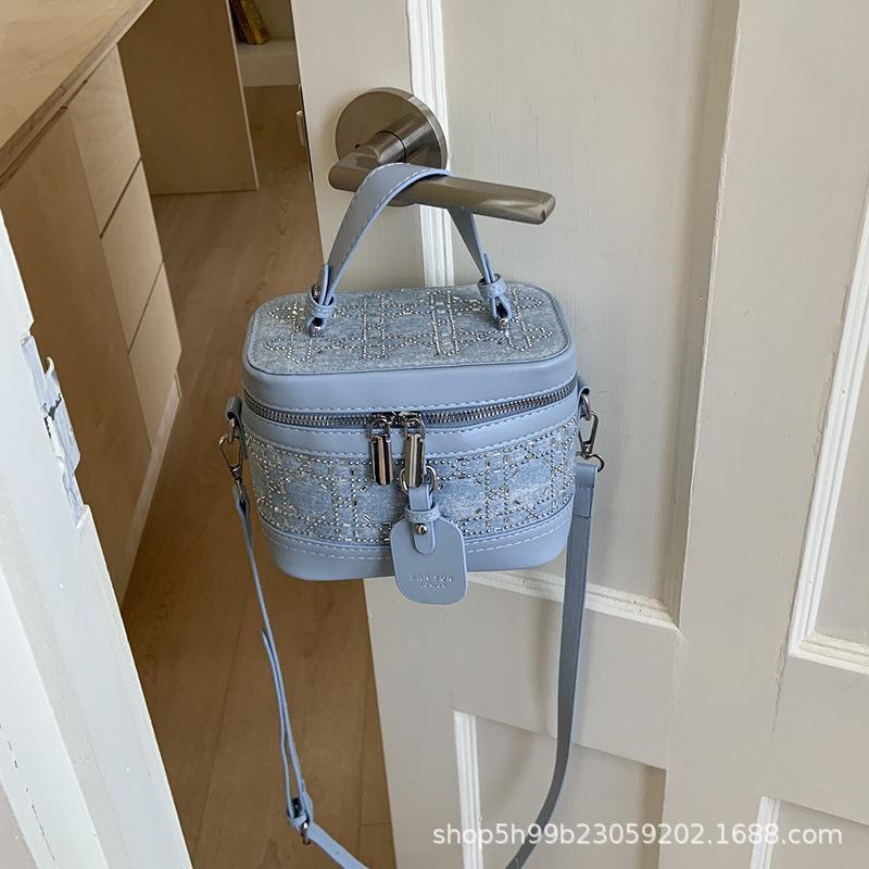 

Hand carry high-end bucket bag women s fashion shoulder bag summer new niche simple casual women s bag синий