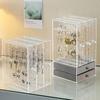 A clear earring and necklace display case, vintage plastic storage case with drawers for bracelets, rings and accessories