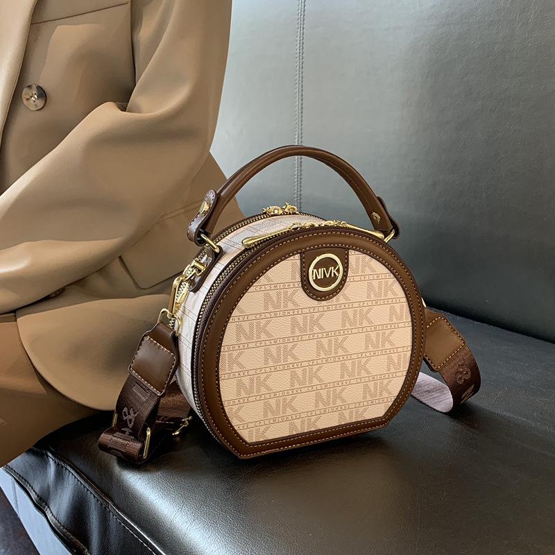 

2025 French Retro Round Cake Crossbody Bag