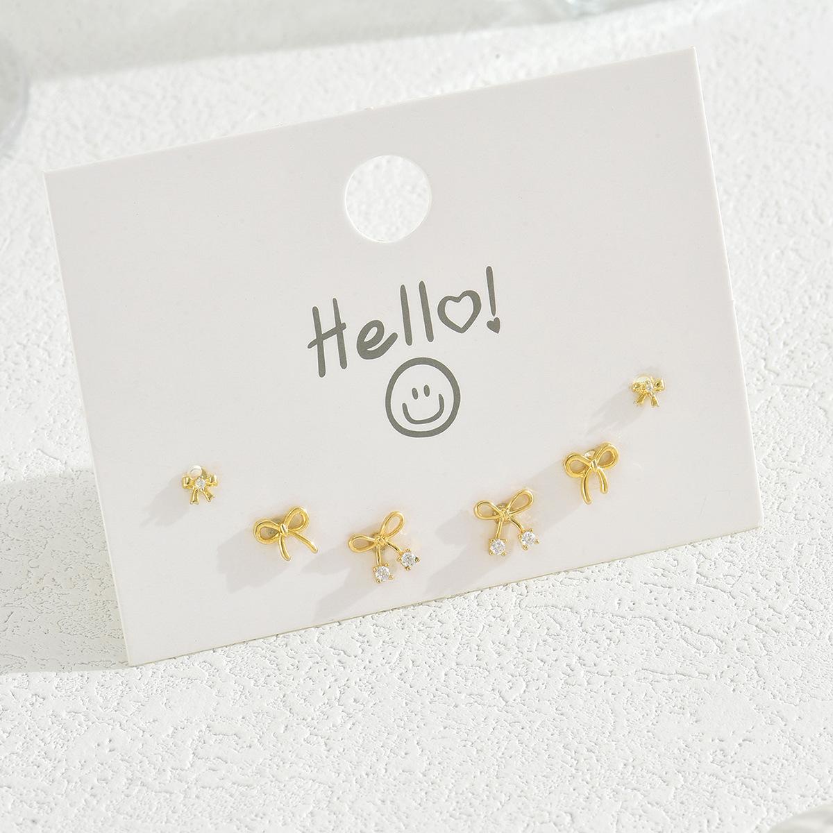 

Sweet Mori women s earrings set, bow copper inlaid zircon design stud earrings temperament versatile earrings