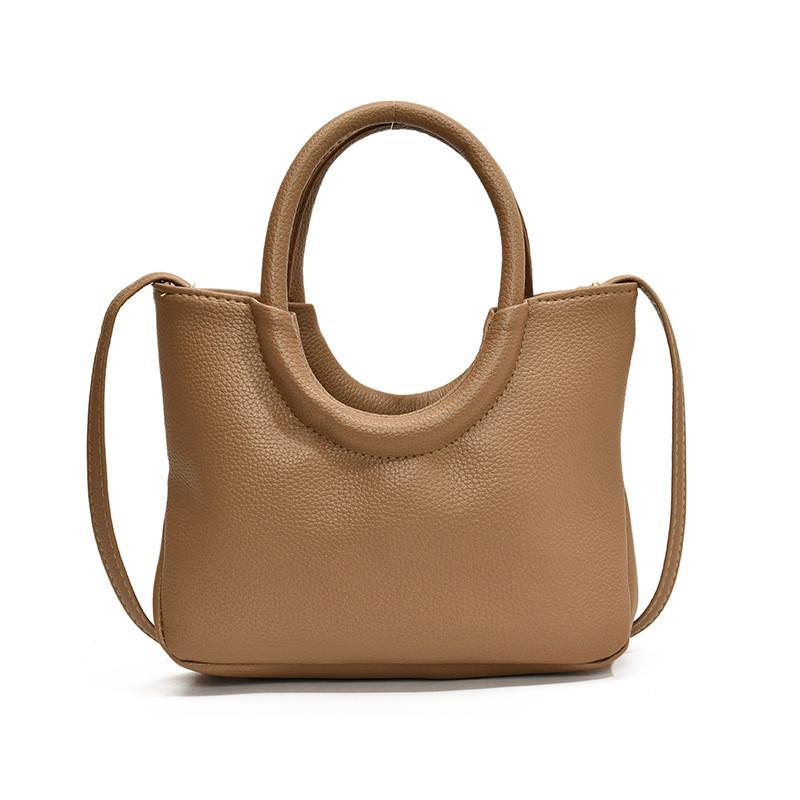 Urban Minimalist Creative Round Handheld Bag Large Capacity Tote Bag In Chic Brown Khaki White And Black Colors For Everyday Use