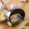 Stainless Steel Garlic Press & Peeler - Manual Ring-shaped Masher & Mincer Tool for Kitchen Use