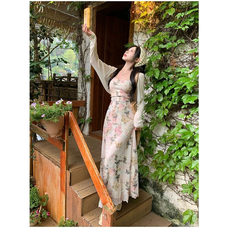 Chic and Feminine Sleeveless Maxi Dress with Floral Print and Waist Cinching