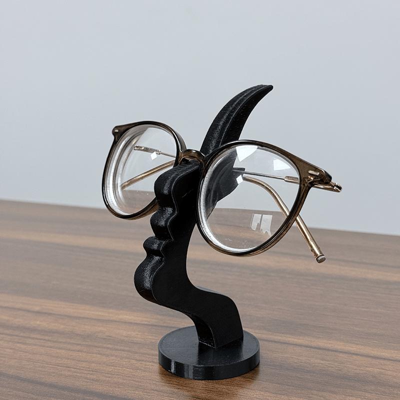 Creative side-face shaped eyeglass stand, unique curved eyeglass frame stand, desktop storage rack