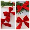 Festive Christmas Window Hanging With Red Bow And Ball Garland For Hotel Decor