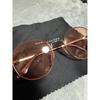 Used MARC JACOBS pink round sunglasses with case
