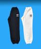 Daenkkomma Crayon Shin-Chan 1992 Face Embroidery Sweatpants (Black, Cream)