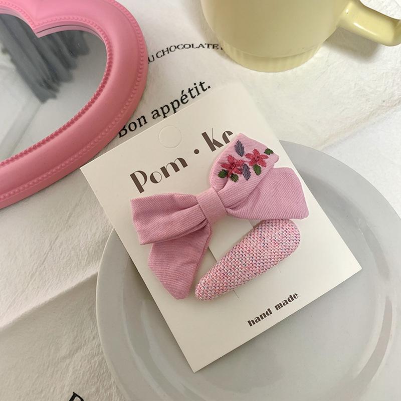 

Корейская розовая заколка-бантик с цветком для детской челки и пушистых волос
