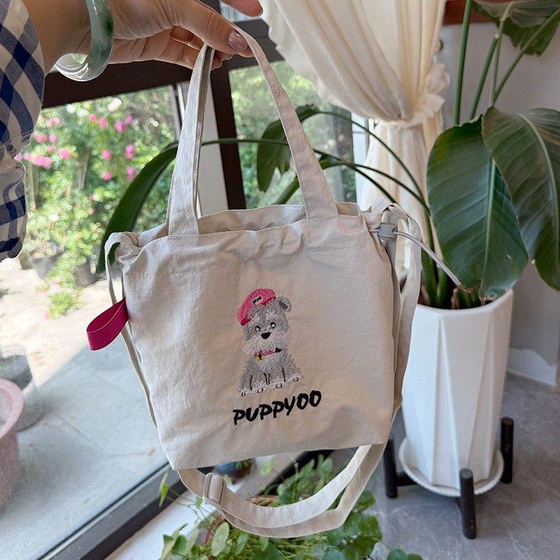 

2025 Summer New Shoulder Small Bag Shopping Versitile Fashion Ins Style Cute Embroidered Pattern Bag for Girls Grey puppy Grey puppy Drawstring Crossbody Bag