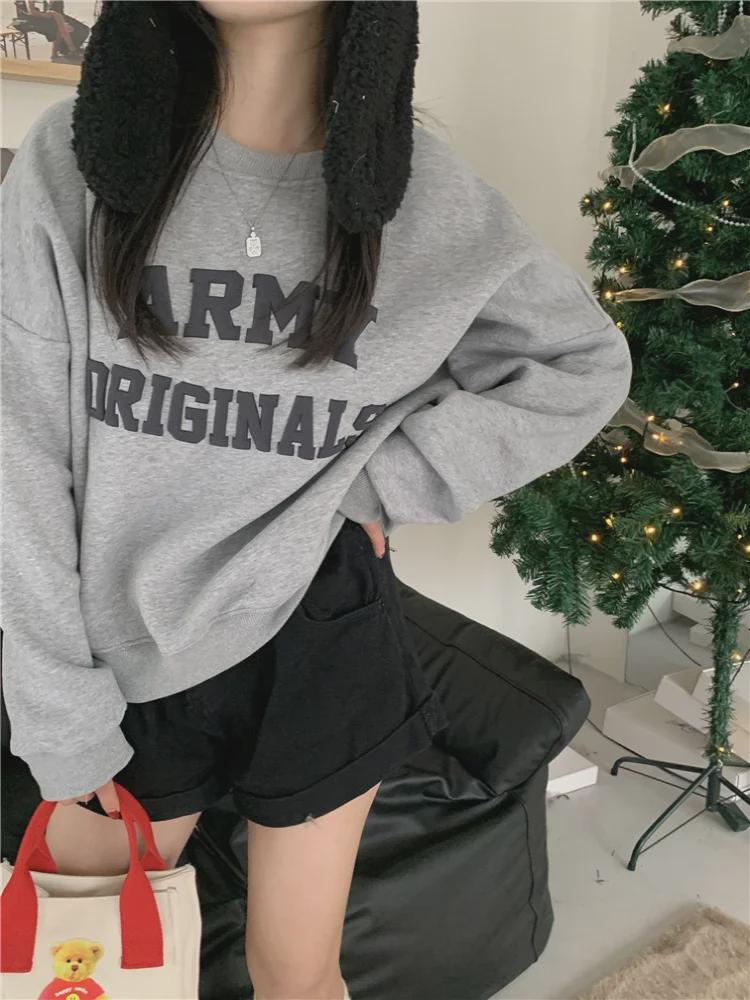 Dámský vintage svetr s kulatým výstřihem, dlouhým rukávem a volným úpletem