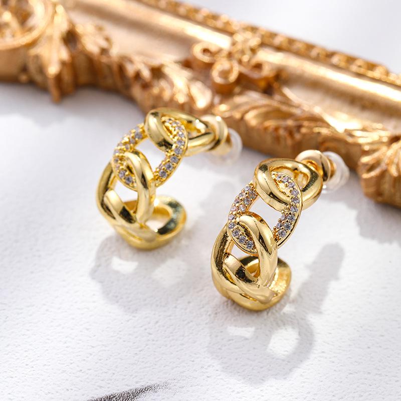 925 Gold-Plated Zircon Twist Hoop Earrings: Elegant, Versatile, and Atmospheric Design