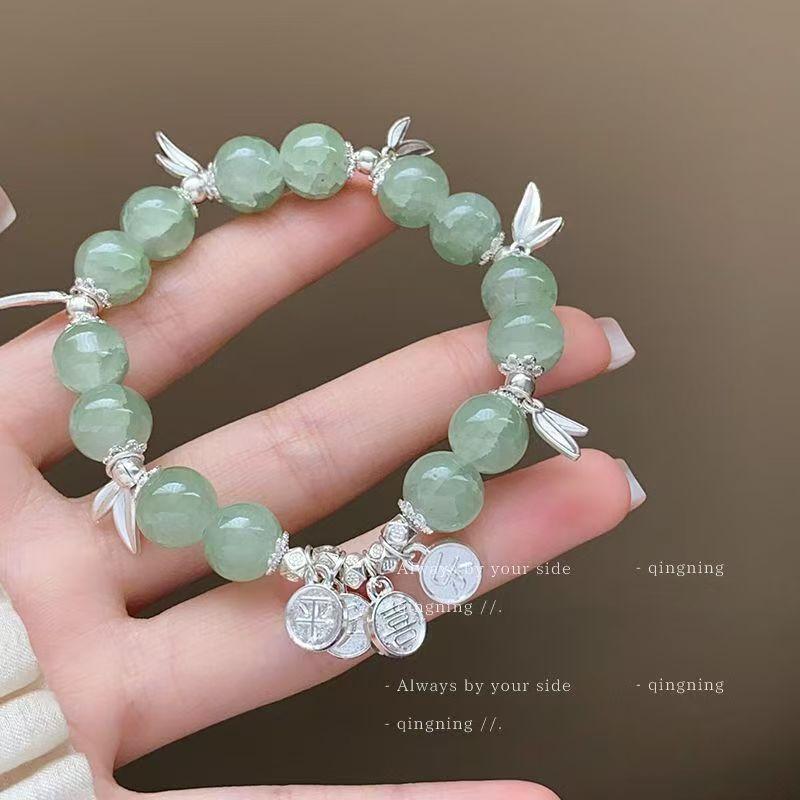 Silver Four Leaf Clover Charm Bracelet with Round Beads Adjustable Chain Link Design for Everyday Wear and Special Occasions Jewelry Accessory
