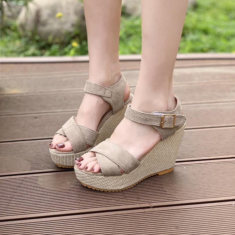 

2025 summer new vacation wind slope heel heel muffin sandals women s summer new straw waterproof table T-button 40