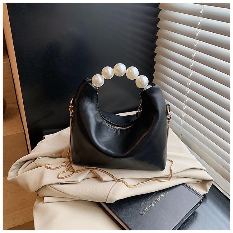 

New fashion niche design handbag women s trend casual personality messenger bag simple bucket bag чорний