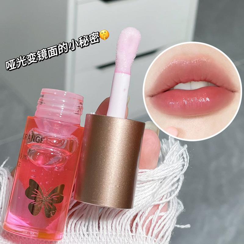 Hydrating Water-Glow Lip Oil: Autumn/Winter Lip Care with Fine Glitter for Long-Lasting, Plump, Moisturized Lips.