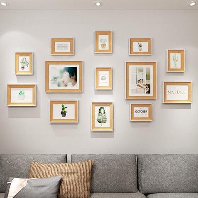 Minimalistisk fotoramuppsättning utan spik för väggdekoration i vardagsrummet