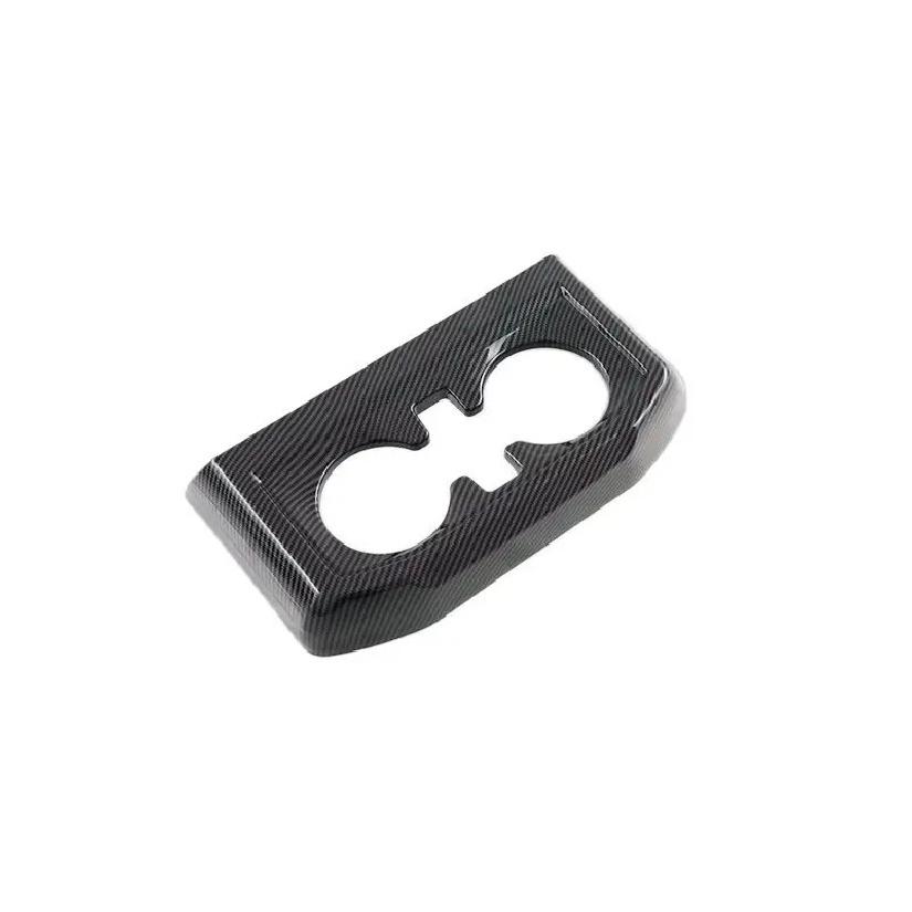 For Ford Raptor F150 P702    Car Accessories Carbon Fiber Style Middle Armrest Box Water Cup Frame Decoration