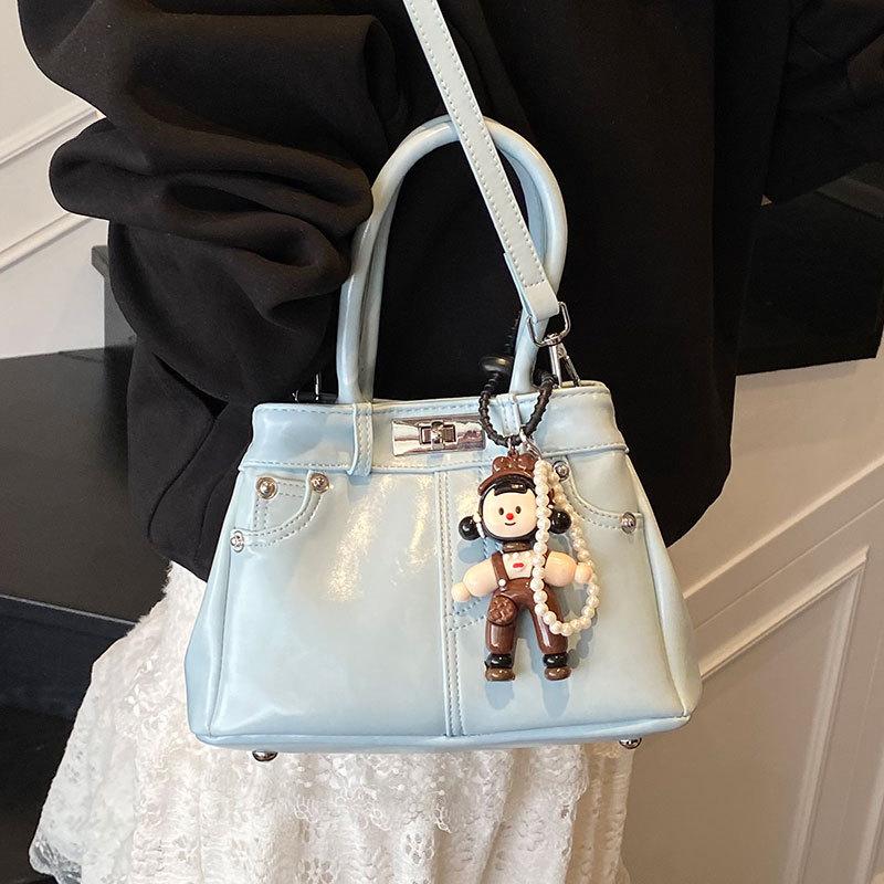 Spring and Summer New French Fashion Commuter Style Portable Bucket Bag Women's Versatile High-quality Foreign Leisure Messenger Bag