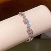 Pink Diamond Zirconia Starburst Flower Bracelet: Trendy, Luxurious Jewelry with Unique Design.
