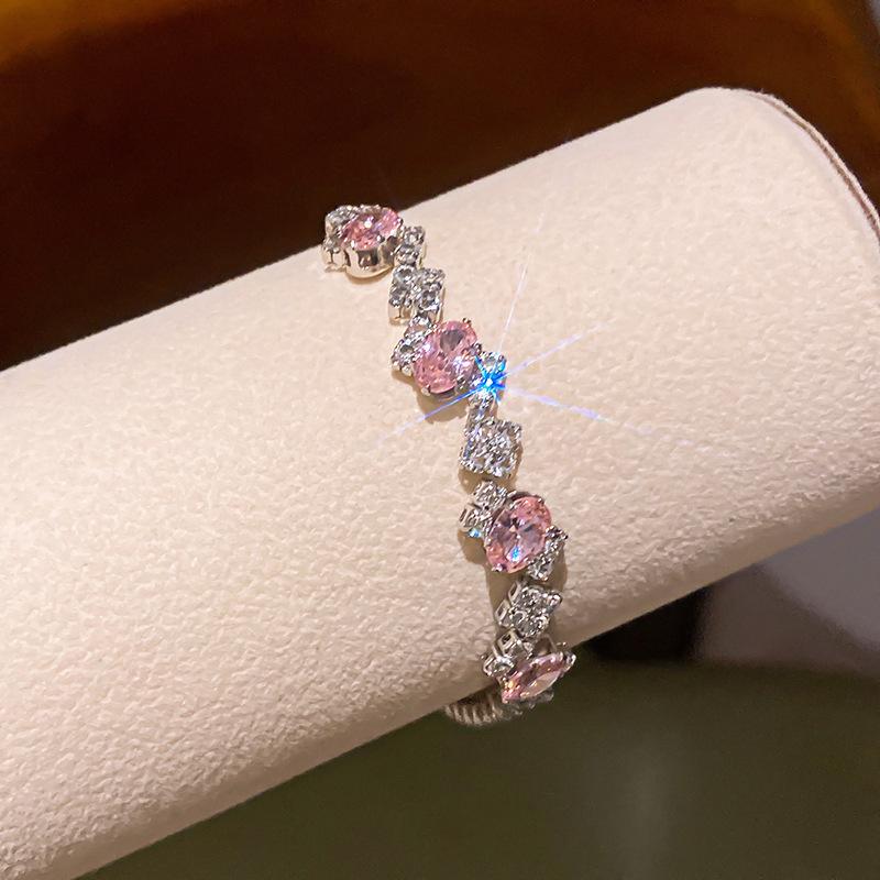 Pink Diamond Zirconia Starburst Flower Bracelet: Trendy, Luxurious Jewelry with Unique Design.
