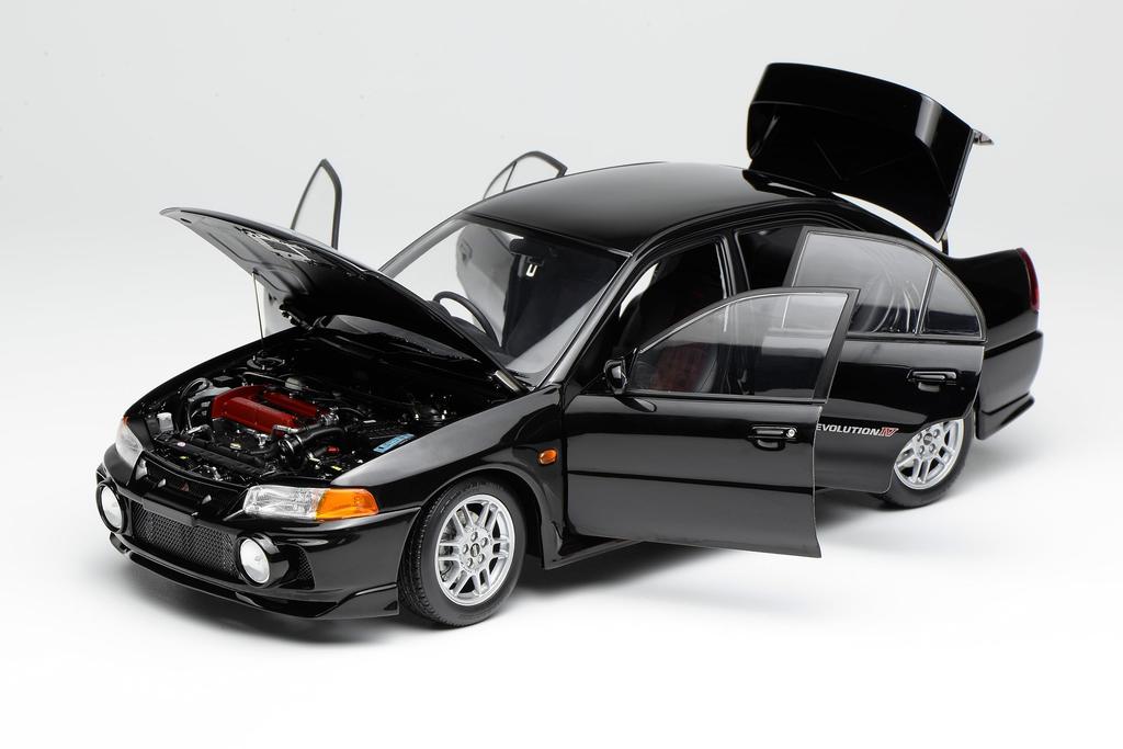 FREESTYLE MOTORHELIX Mitsubishi Lancer Evolution IV Pyrenees Black Pearl Finished Product M84002 1/18