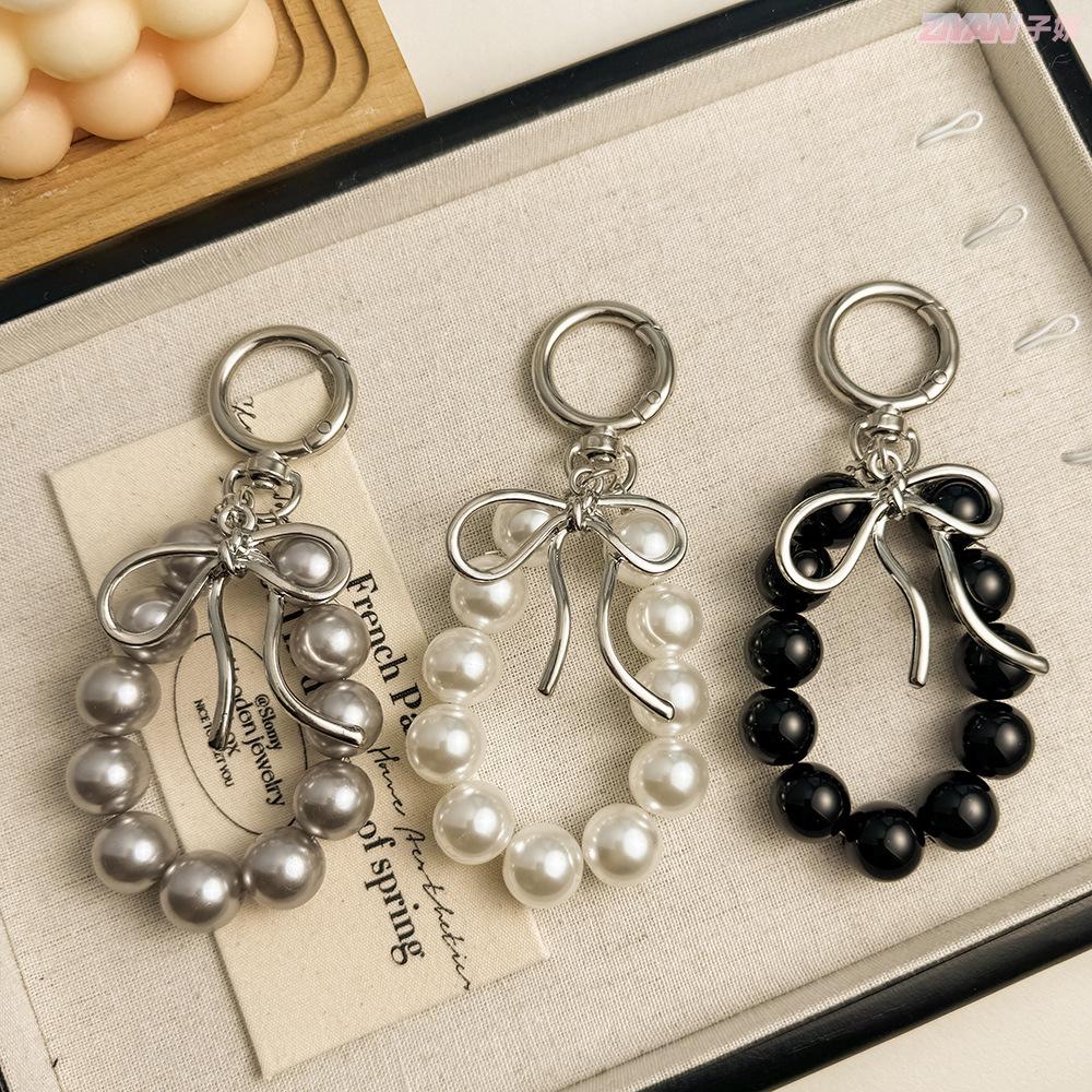 Korean Style Keychain Pendant: Metal Irregular Bow with Pearl Beads for Phone or Bag Accessories