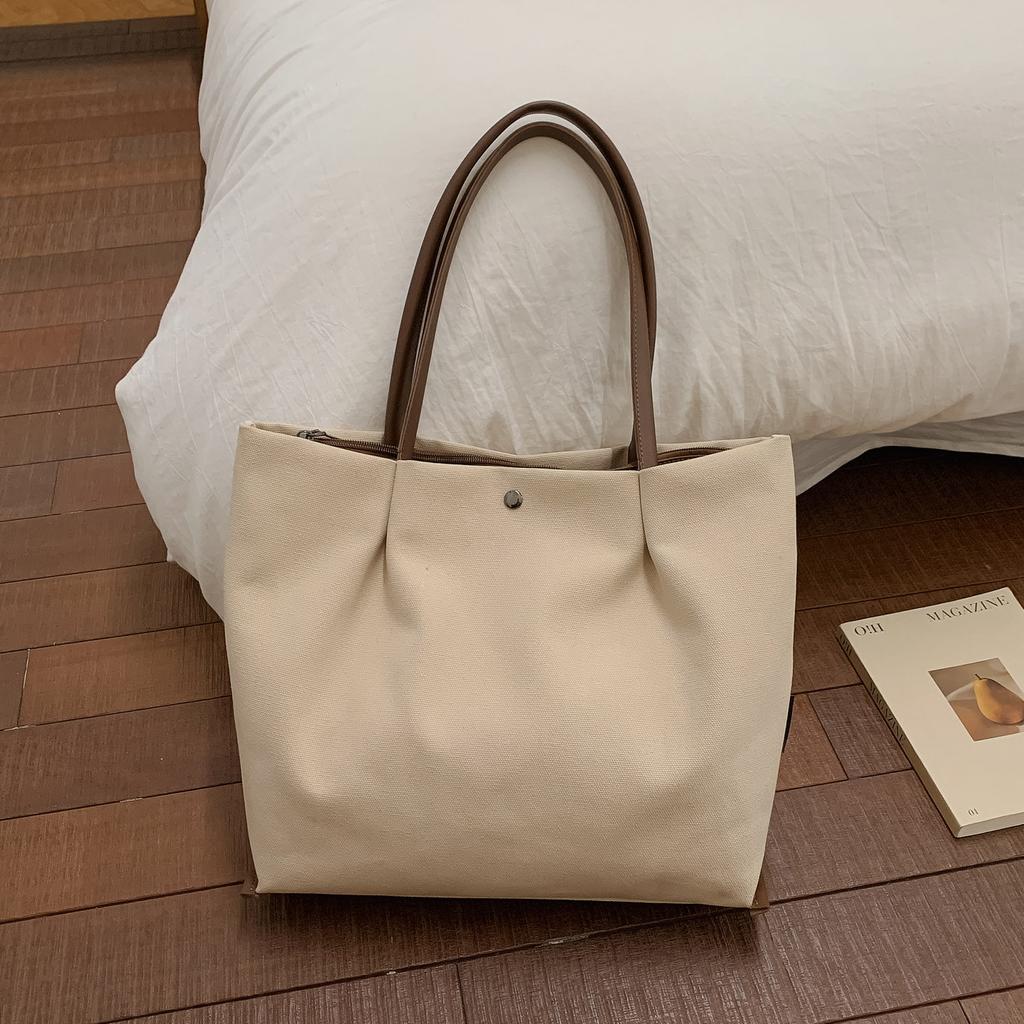 Japanese Casual Canvas Bag Women's Large Capacity Lightweight Handbags 2026 New Solid Color Commuting Shoulder Bags