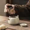 Light luxury beige Ru kiln lifting beam pot Kung Fu tea set, high-end tea making, household tea kettle, single pot tea making device
