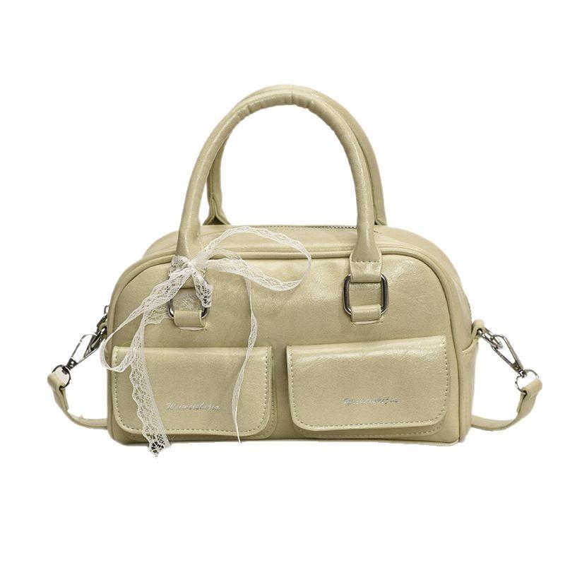 Fashion portable small square bag women's 2025 new hand-held class commuter leisure shoulder bag versatile oblique span women's bag