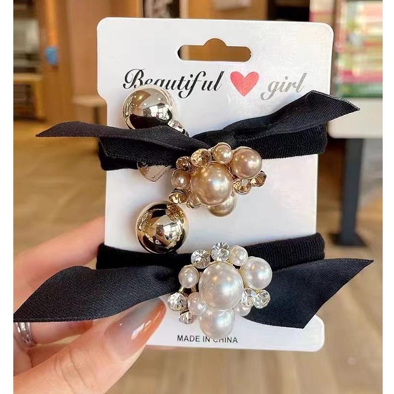 Korean Pearl Bow Hair Tie – Elegant Ponytail Accessory