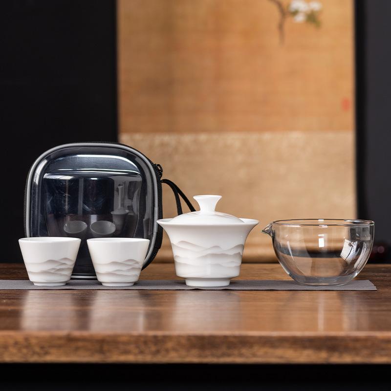 

High-grade suet jade porcelain travel tea set Kuaike cup one pot and two cups outdoor portable teacup teapot light luxury souvenir