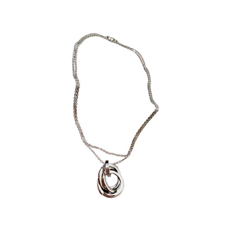 Zircon Interlocking Pendant Necklace - Unique Sweater Chain with Cool Style for Luxurious Fashion.