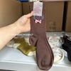 Brown Retro Trend Leopard Print Socks Women'S Medium Tube Autumn And Winter Korean Versatile Bow Pure Cotton Calf Stacking Socks