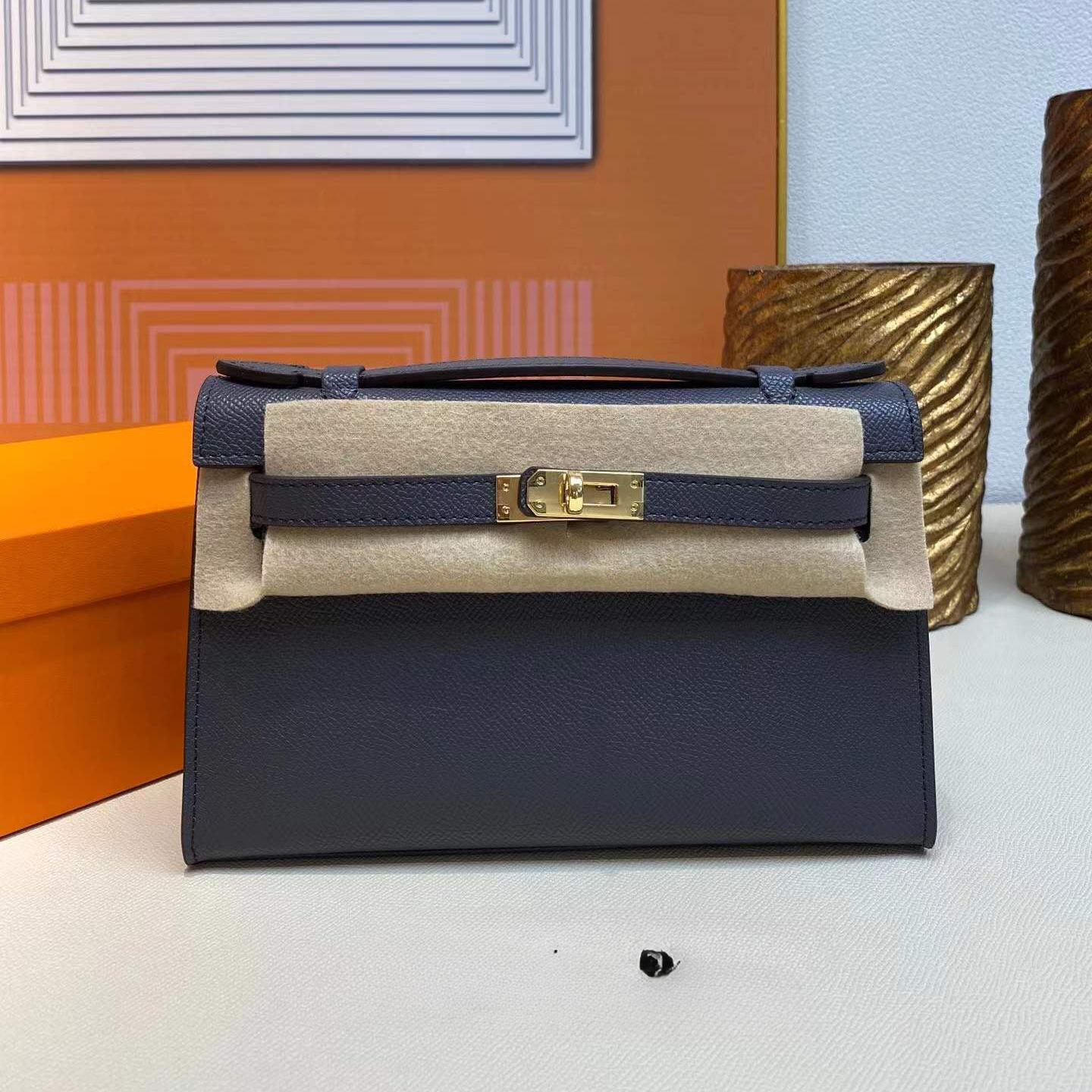 

Оптовая продажа нового поколения простой маленькой квадратной сумки через плечо, с косым ремнем, портативной, из первого слоя коровьей кожи, женской сумки, с отстрочкой 22x7x13cm