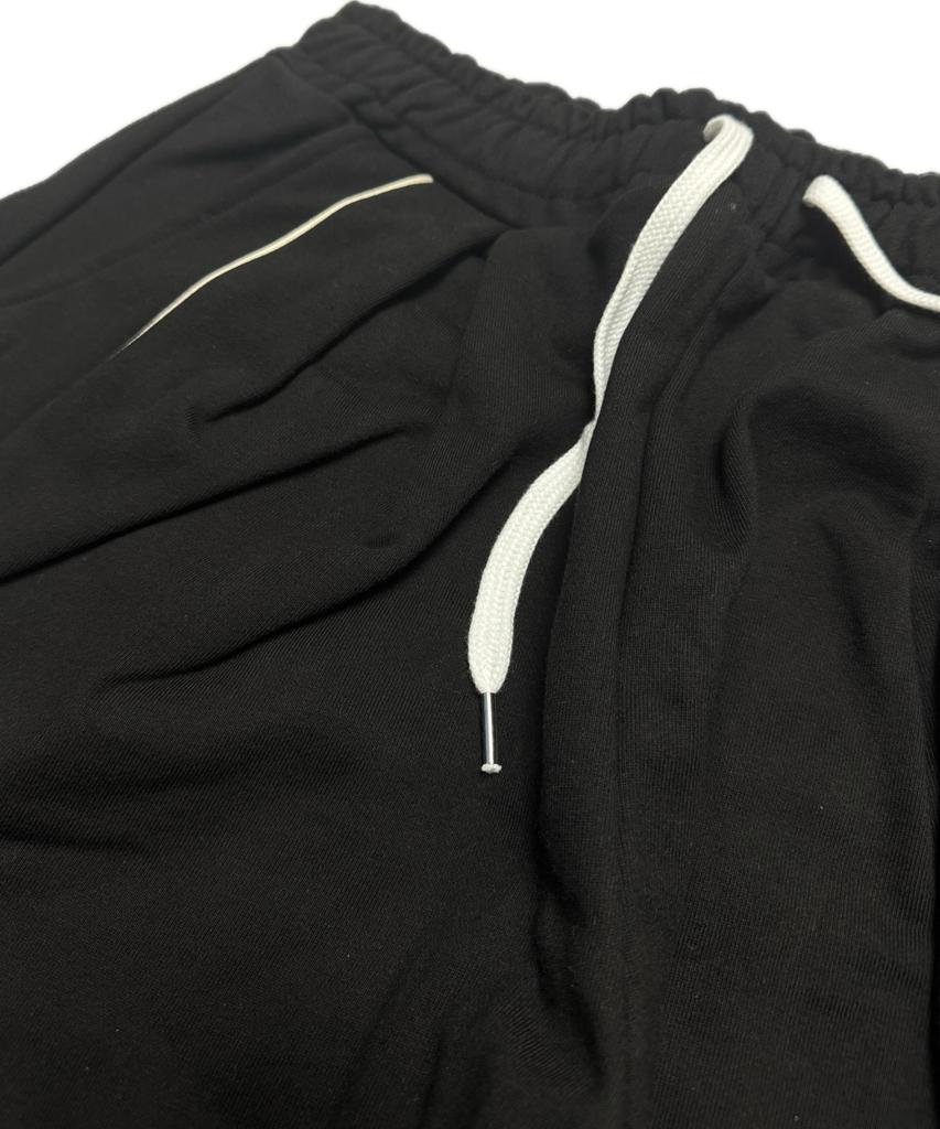 Aseuteleuwoldeu Symbol Logo Two-Tuck Cotton Track Pants (Black)