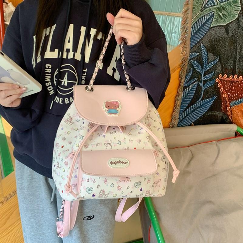High-value girls toilet bag, simple casual small backpack, cute bow floral college style flip backpack.