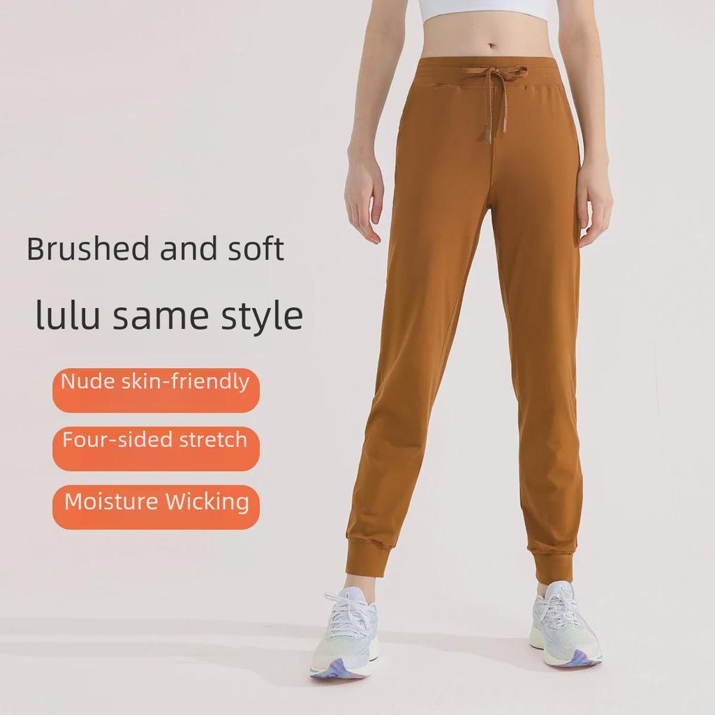 Women's Green Drawstring Quick-Dry Sports Pants: Lightweight, High-End, Straight-Leg Design for Summer.