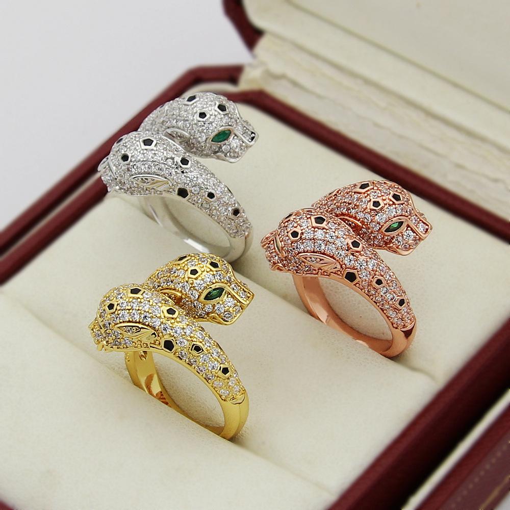 Ach, zlaté šperky, zelené diamantové oči plné diamantů, otevřený prsten s dvěma leopardy, prsten s hlavami dvou leopardů plný diamantů, leopard.